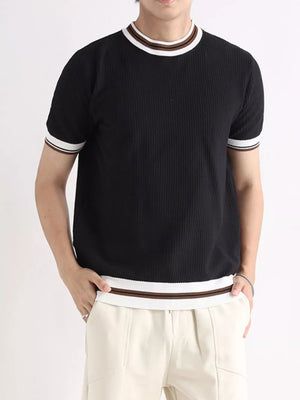 Textured ribbed black crew neck t-shirt with white and brown striped trim on collar and sleeves.