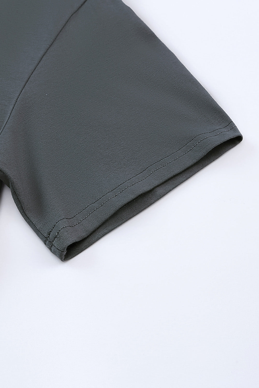 Mid gray cotton t-shirt with a relaxed fit and double-stitched sleeve hem.