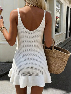 White openwork knit sweater dress with V-neck and frill hem.