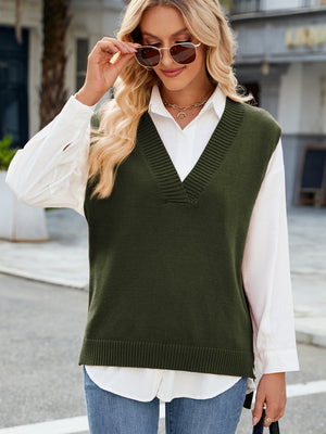 Army green ribbed knit V-neck sweater vest with a classic fit, styled over a white button-down shirt.