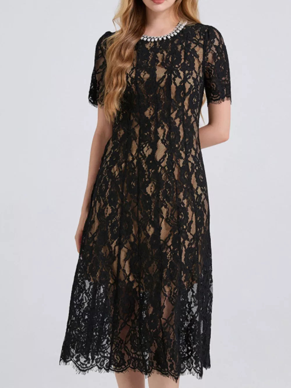 Black lace midi dress with pearl-embellished neckline and short sleeves.