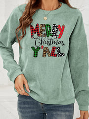 Sage corduroy sweatshirt with Merry Christmas Y'all graphic in buffalo plaid, leopard, and polka dot patterns.