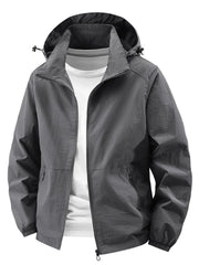 Grey hooded windbreaker jacket with zip front and pockets