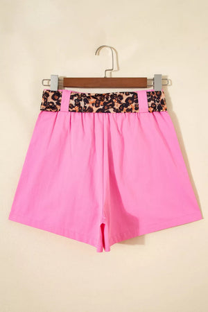 Pink chino shorts with high-waisted leopard print belt detail