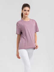 Dusty Pink performance tee with seam details and crew neck.