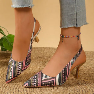 Geometric patterned slingback kitten heels in multicolor with pointed toe and kitten heel.