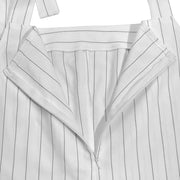 Chic white pinstripe tie-strap wide-leg romper with open zipper detail.