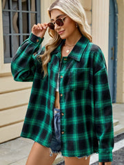 Dark Green and Black plaid collared long sleeve button-up shirt with chest pockets.