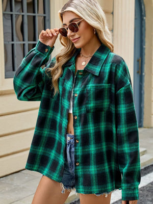 Dark Green and Black plaid collared long sleeve button-up shirt with chest pockets.