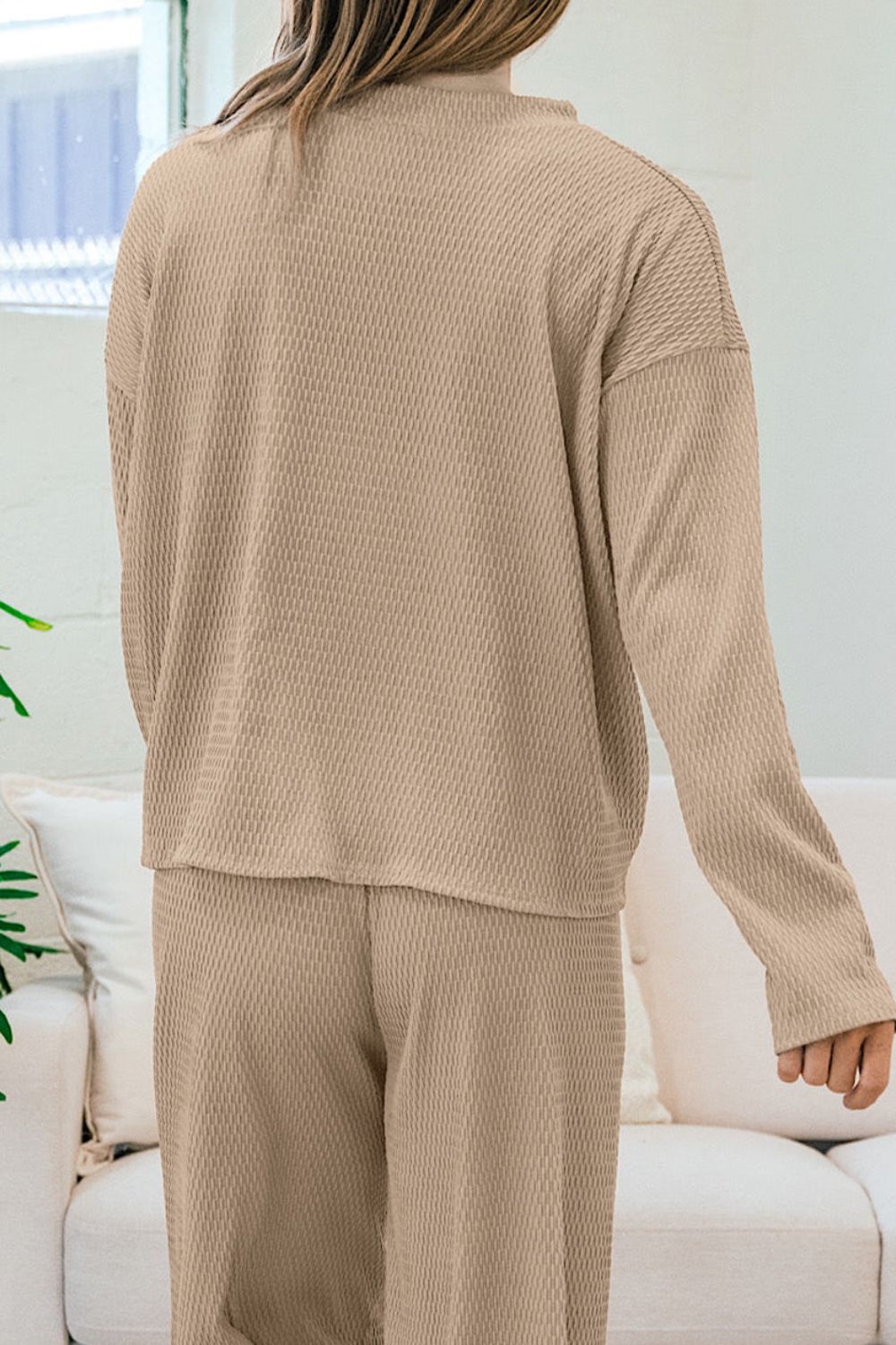 Textured knit lounge set in khaki, featuring a long sleeve top and wide leg pants.