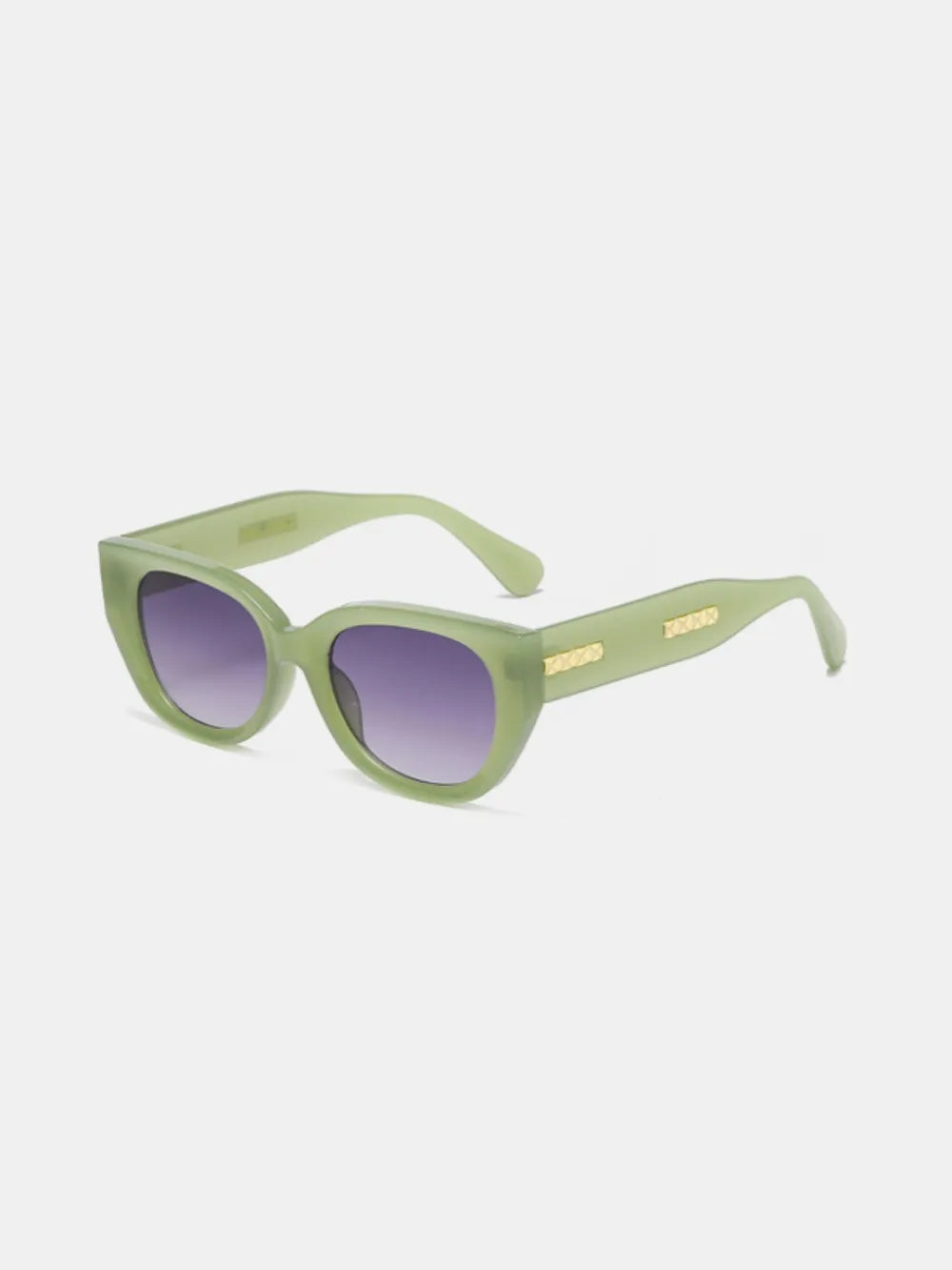 Sage green sculpted cat eye sunglasses with gold accents and gradient lenses.