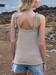 Knit tank top in Mocha with tie straps and deep V-neck, styled with denim shorts.