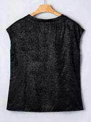 Black metallic tee with cap sleeves and round neck, textured polyester blend.