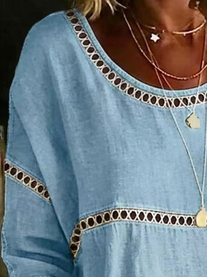 Sky blue maternity t-shirt with openwork floral trim at neckline and hem.