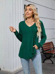 Elegant V-neck long sleeve maternity t-shirt in dark green with subtle pleating detail.