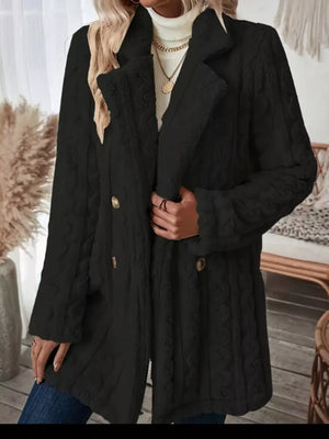 Black faux shearling double-breasted overcoat with textured cable knit pattern and gold buttons.