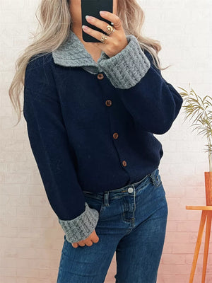 Navy button-down cardigan with textured grey knit collar and cuffs.