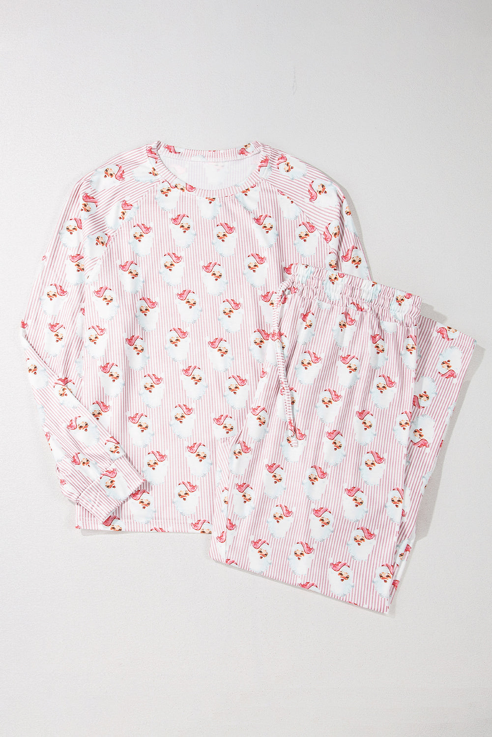 Santa Stripe Lounge Set in blush pink with a Santa Claus print and pinstripes.