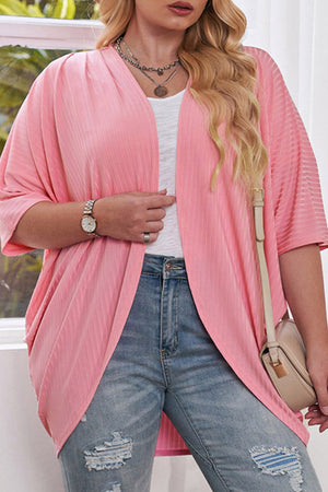 Pink ribbed batwing cardigan with drape front and wide sleeves.