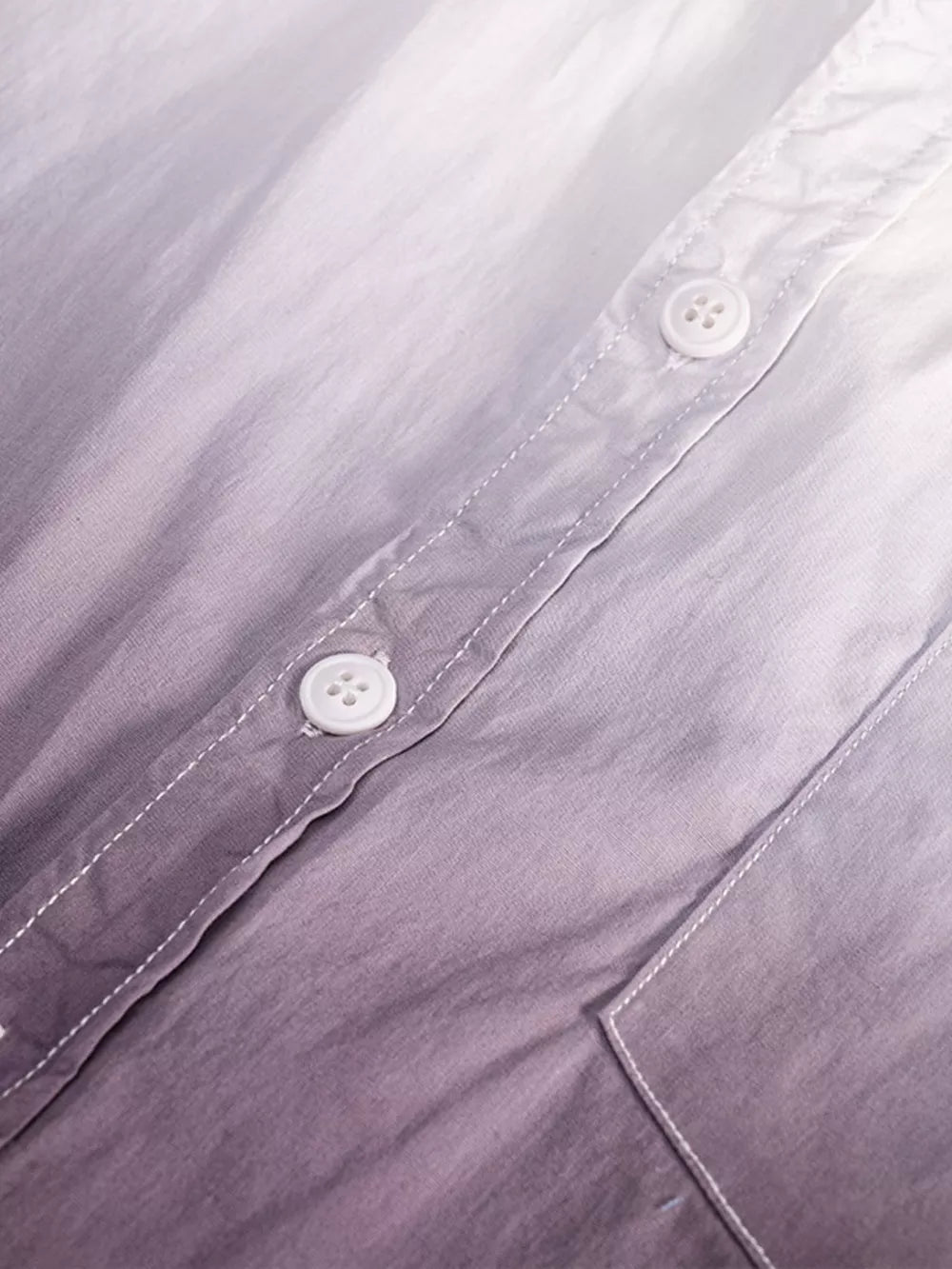 Men's cotton button-down shirt with a blue-to-white gradient and white stitching.