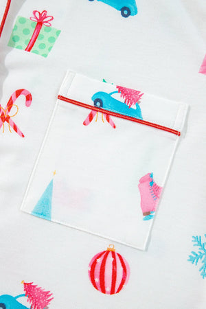 White cotton pajama set with festive holiday print and contrast piping on pocket.