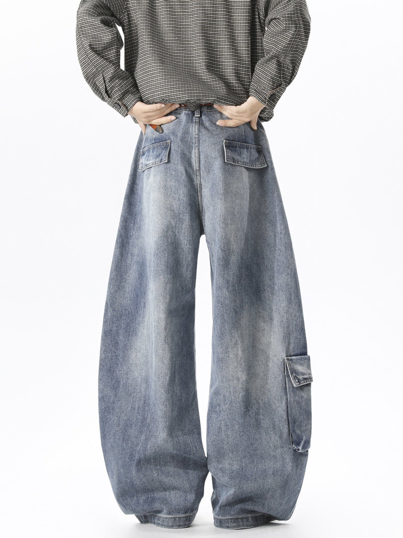 Men's blue wide leg cargo jeans in 100% cotton with multiple pockets.
