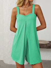 Lime green pleated bodice pocketed romper with wide straps and sweetheart neckline.