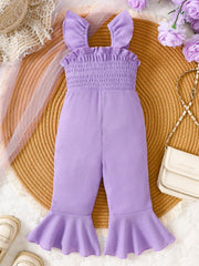 Purple baby jumpsuit with smocked bodice, ruffle straps, and flared legs.