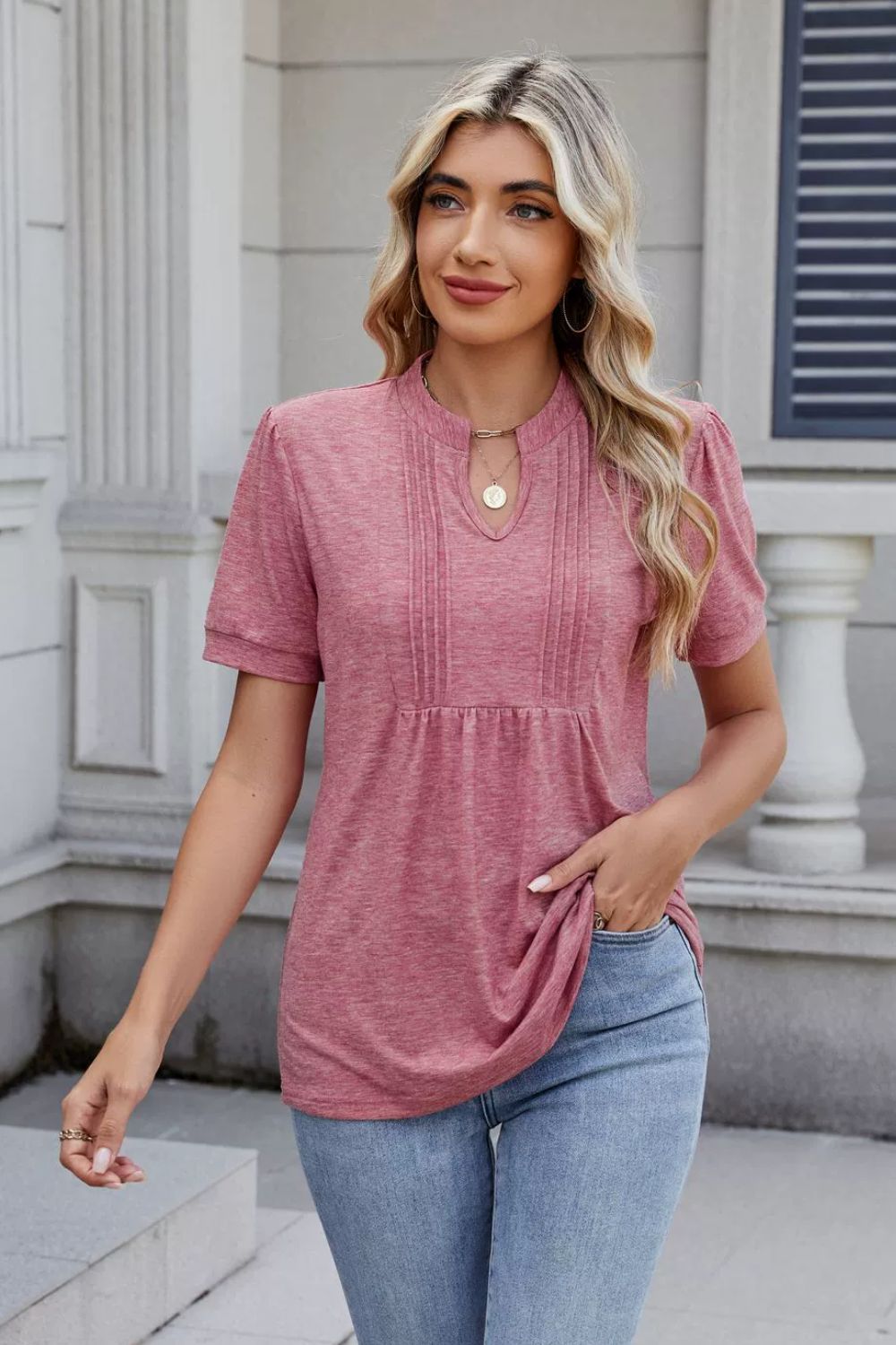 Dusty pink short sleeve blouse with pleated yoke and keyhole neckline
