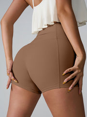 Sculpted pocket detail active shorts in Chestnut with a high waist and fitted cut.