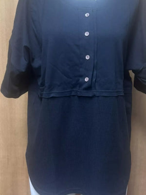 Black waffle-knit t-shirt with button detail and short sleeves.