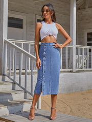 Button-front denim midi skirt in Sky Blue with a slit and button detail.