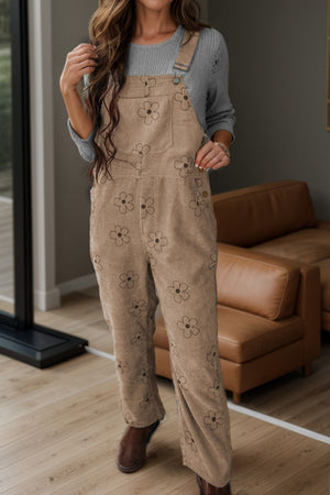 Khaki corduroy overalls with a relaxed fit and all-over floral print.
