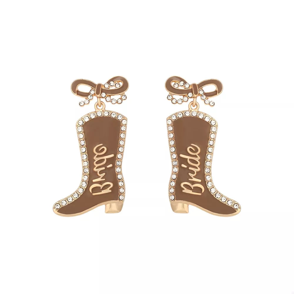Brown bridal cowboy boot dangle earrings with crystal trim and bow detail.