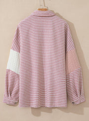 Dusty pink houndstooth shacket with quilted panel details on sleeves.
