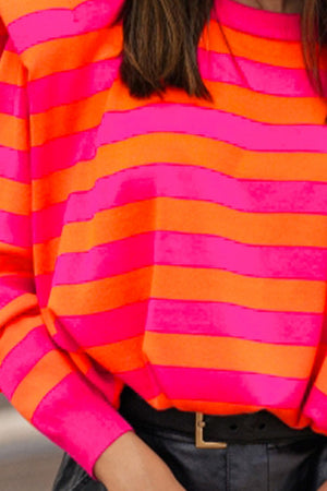 Bold Shoulder Stripe Knit Pullover in hot pink and orange stripes. Long sleeves.