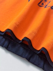 Orange cotton graphic top with navy trim detail