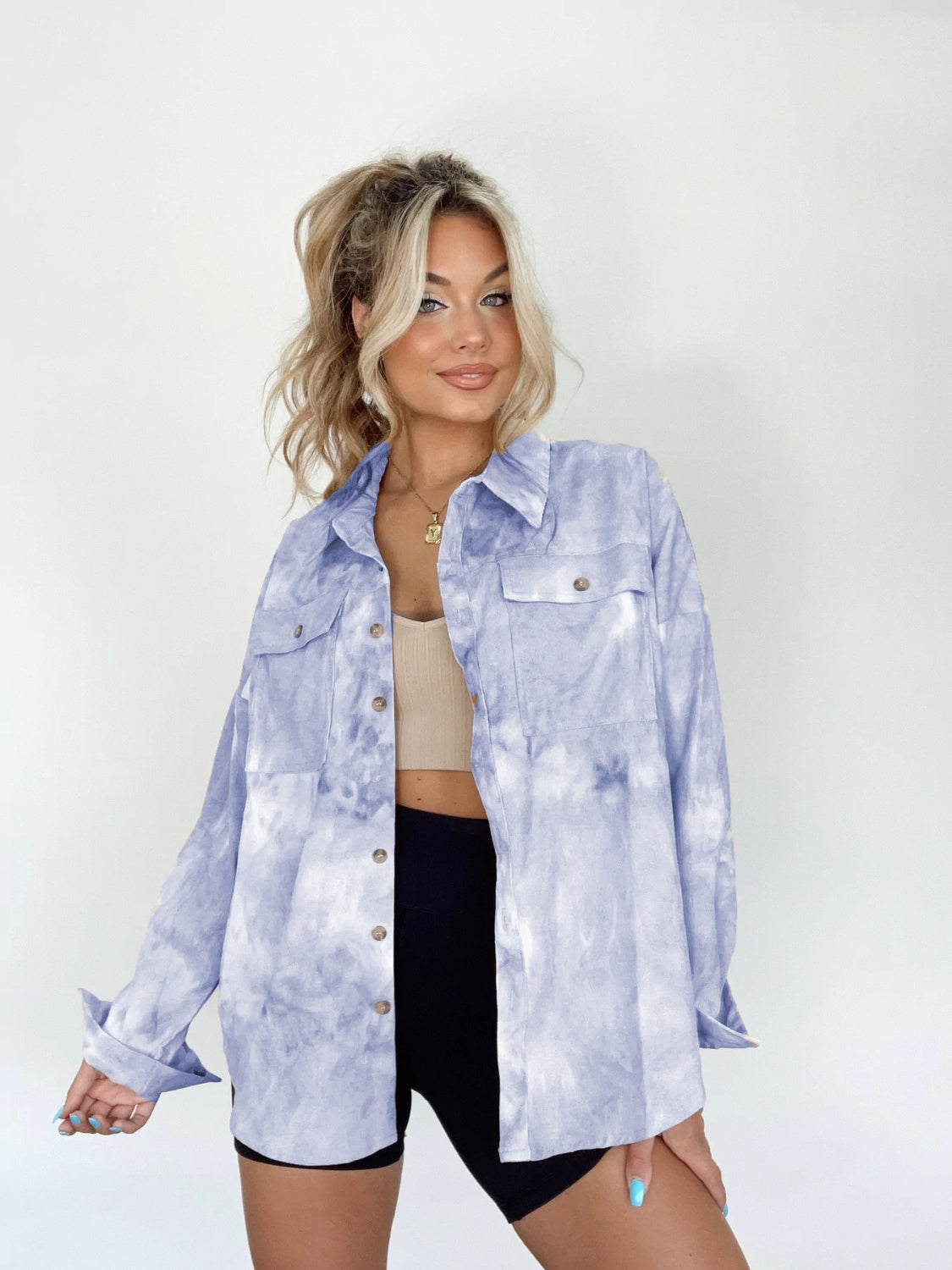 Cloud Wash Overshirt in Misty Blue with patch pockets and button front, styled casually.