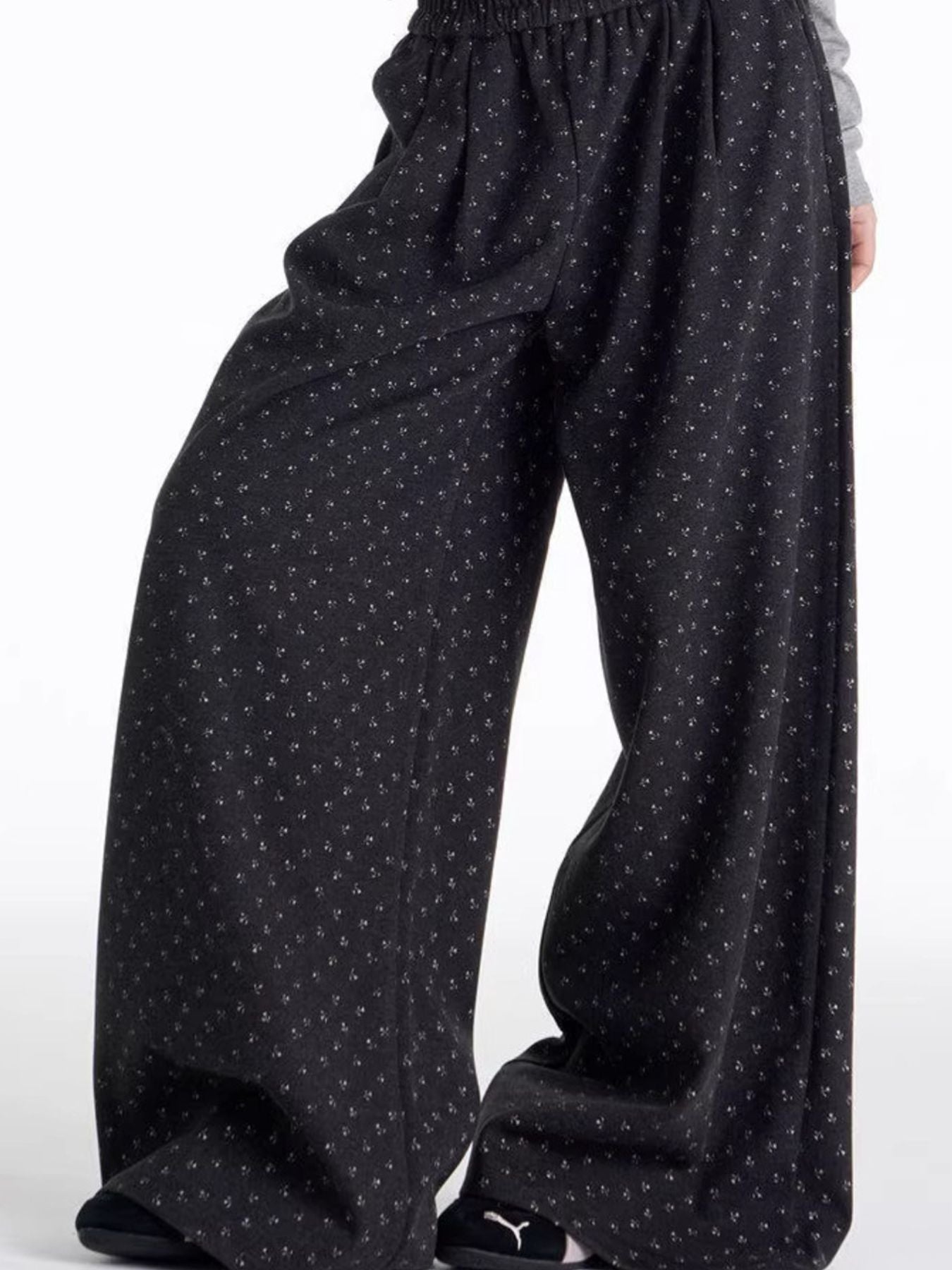 Men's dark floral wide leg sweatpants with relaxed fit and elastic waist.