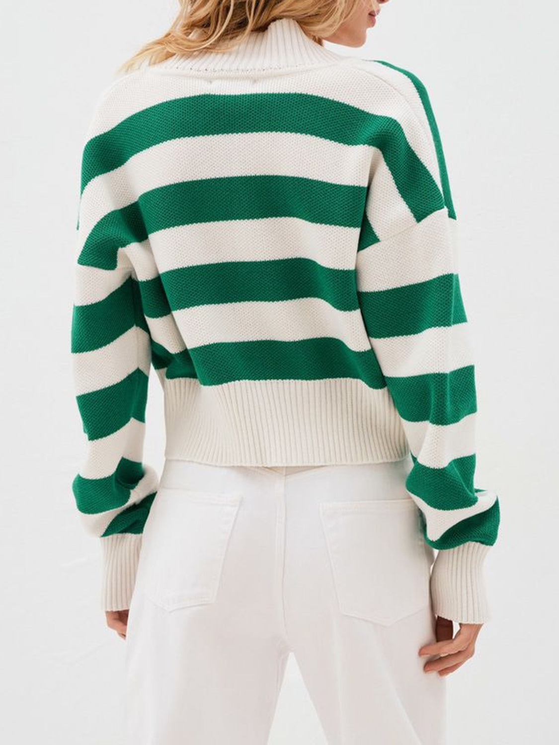 Cropped stripe knit cardigan in dark green and cream acrylic with a ribbed collar and cuffs.