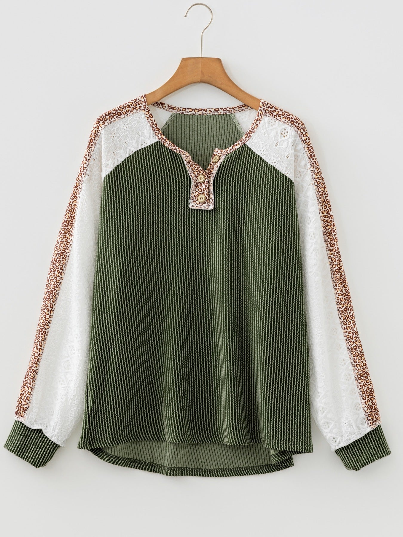 Dark green waffle knit henley top with lace sleeves and animal print accents.