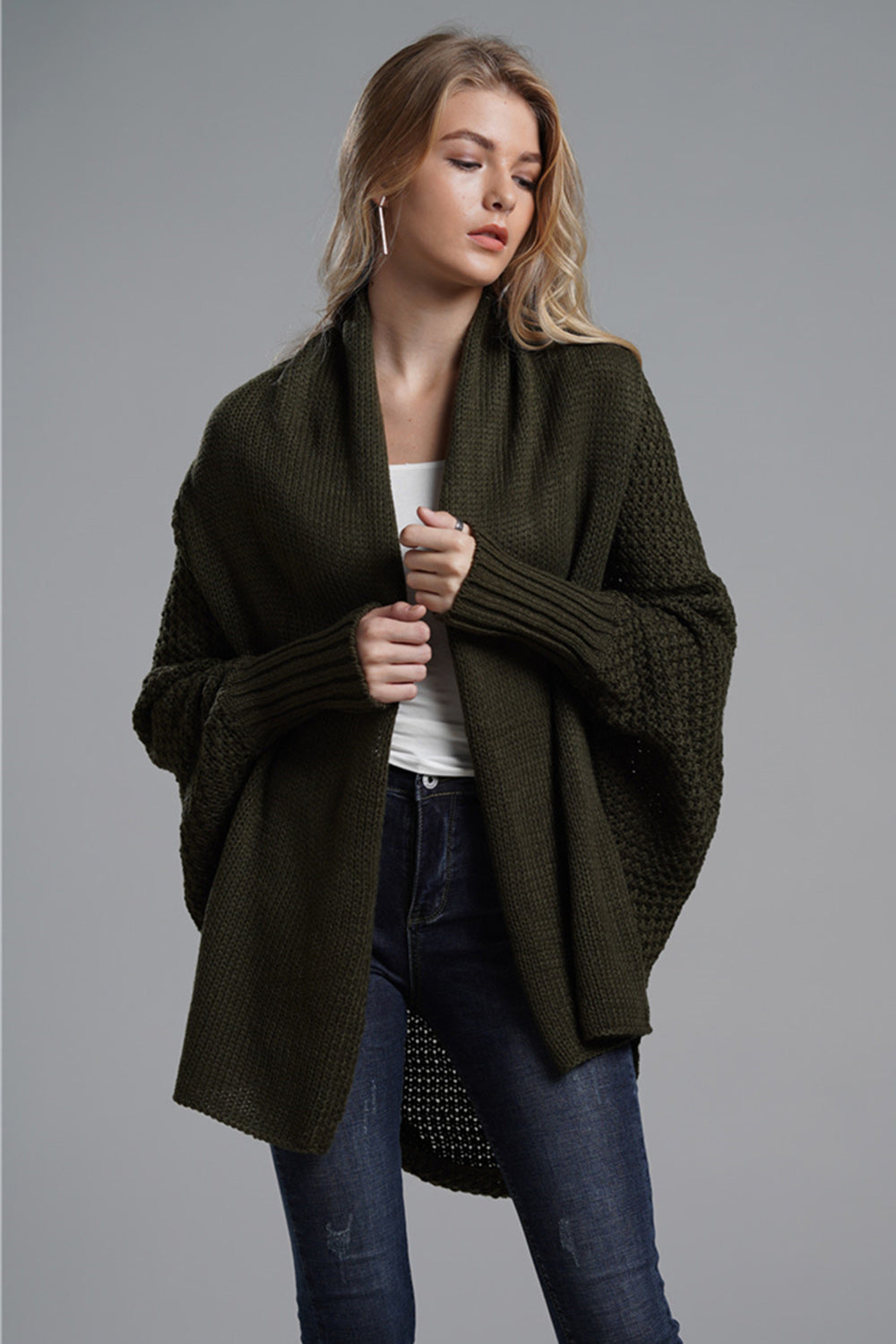 Dark Green Cocoon Knit Sleeve Cardigan with shawl collar and ribbed cuffs.