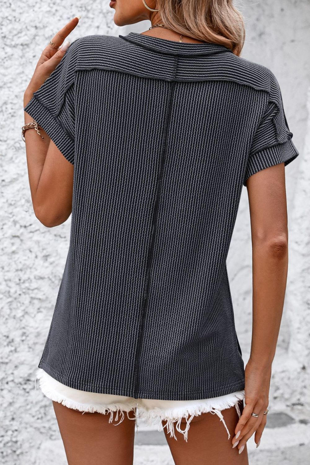 Dark Gray vertical ribbed tunic with split hem and short sleeves, shown from the back.