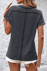 Dark Gray vertical ribbed tunic with split hem and short sleeves, shown from the back.