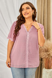 Dusty Pink textured dot blouse with lace trim V-neck and short sleeves.