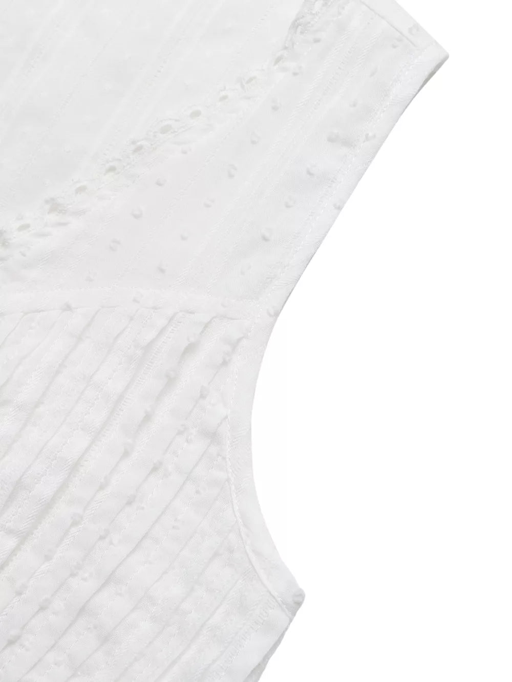 White lace-trimmed sleeveless maternity blouse with textured dot and stripe fabric.