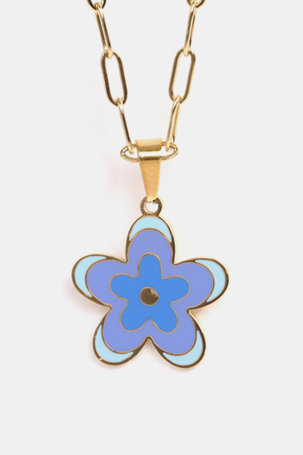 Enamel floral pendant chain necklace with gold-plated links and a multi-tone blue flower charm.