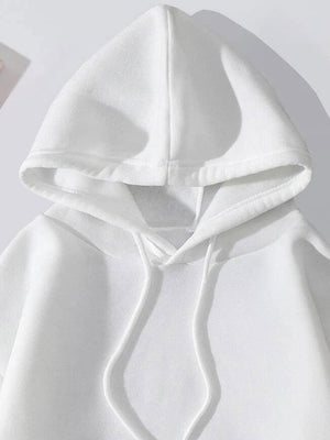 White pullover hoodie with drawstring hood and front pocket detail.