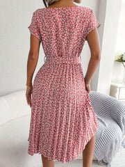 Blush pink floral print midi dress with tie waist and pleated skirt