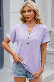 Lavender textured henley tee with rolled sleeves and button detail.